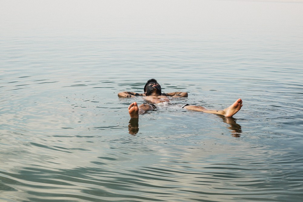 Tourist Floating In Dead Sea