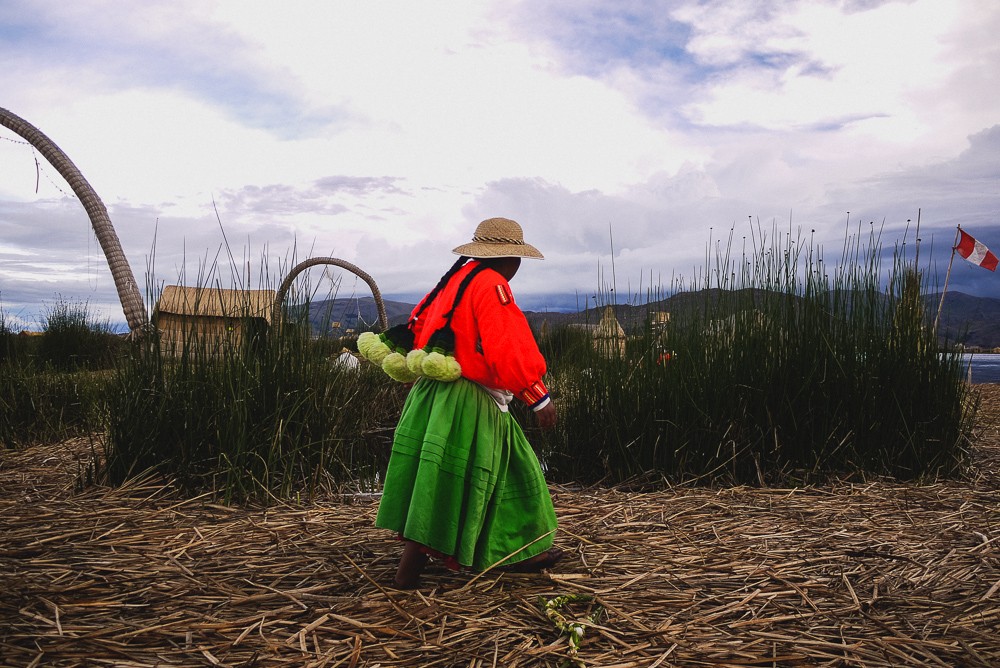 Local Uros Woman On Floating Island In Puno