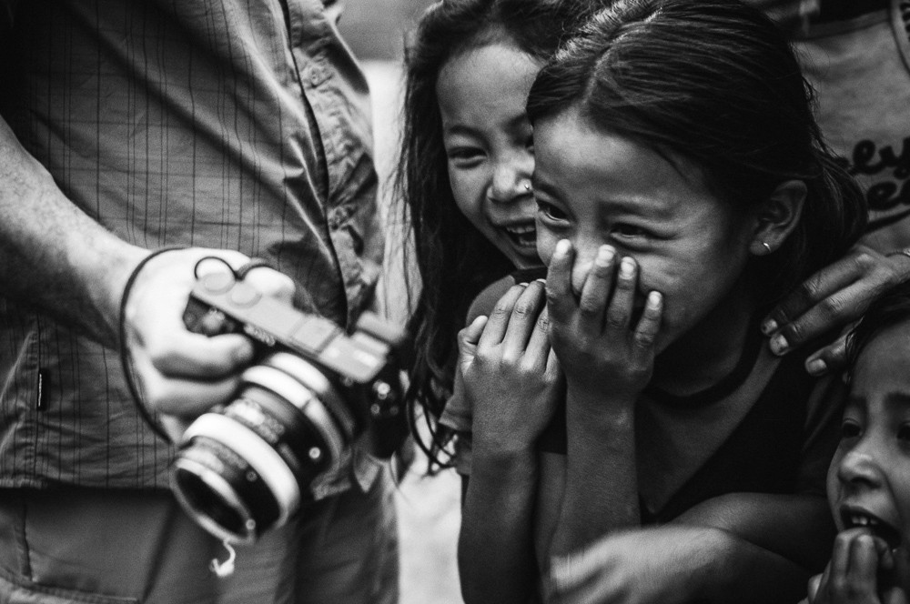 Child Laughing At Camera In Nepal Village Annapurna Circuit