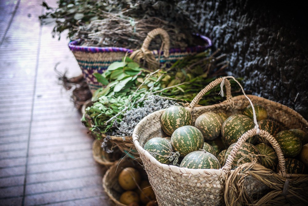 Herbs and vegetables in baskets in Essaouira, Morocco