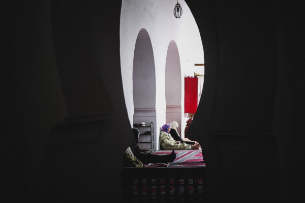 Woman Praying In Mosque