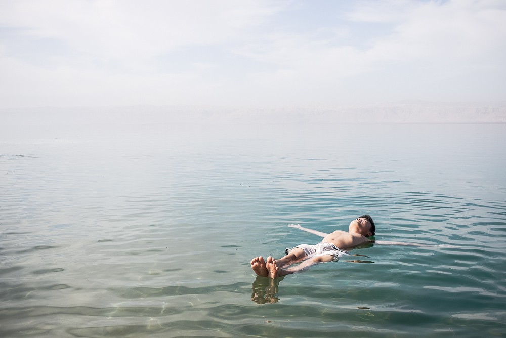 Floating In The Dead Sea In Jordan