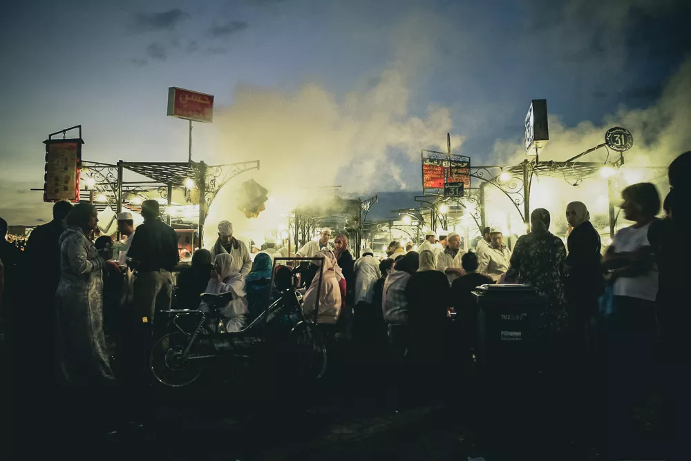 Vendors Locals and Tourists Gather at the Jamaa El-Fna Food Market