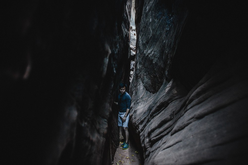 Walking Through Narrow Slot Canyon Lambs Knoll