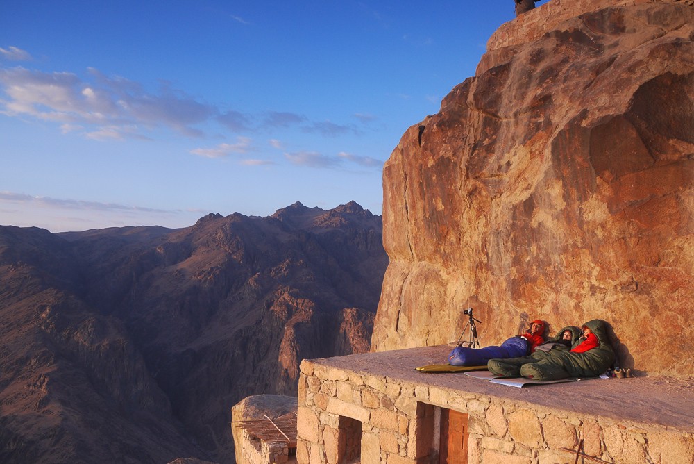 Prepared Hikers Waiting For The Sunrise On Mount Sinai In Sleeping Bags