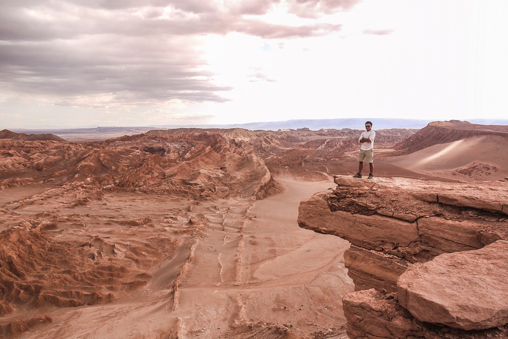 Standing over the Great Crater in the Valle De La Luna, Chile