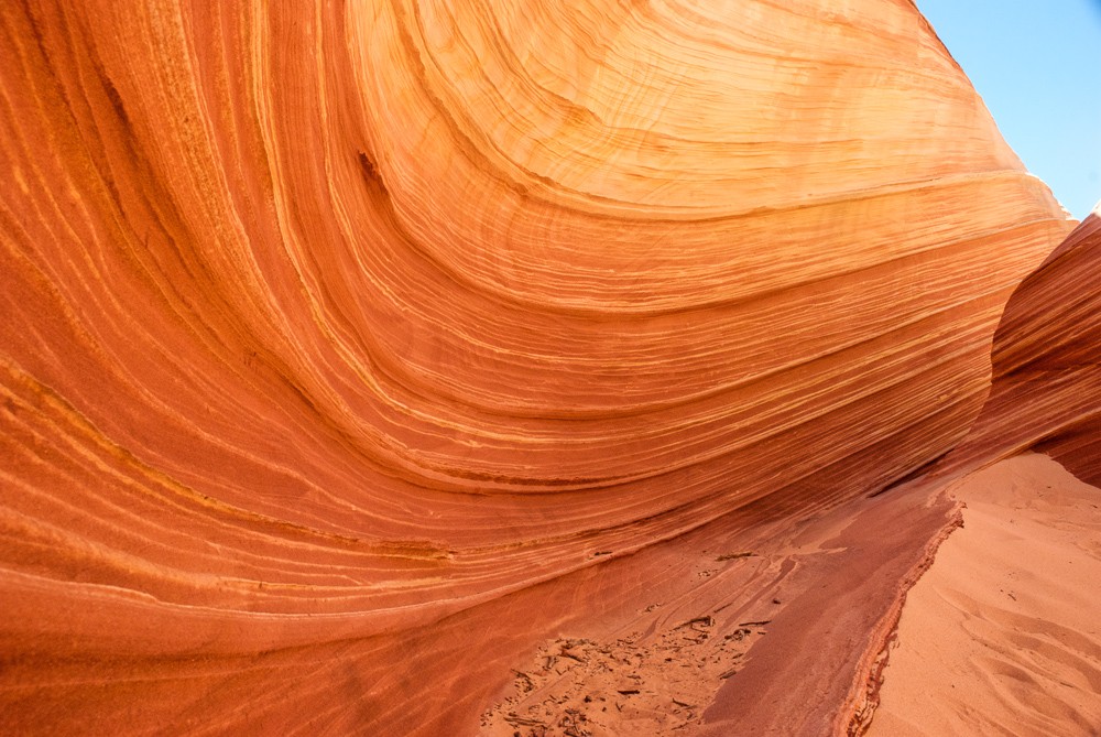 Curved sandstone shaped by wind and wave at the Wave