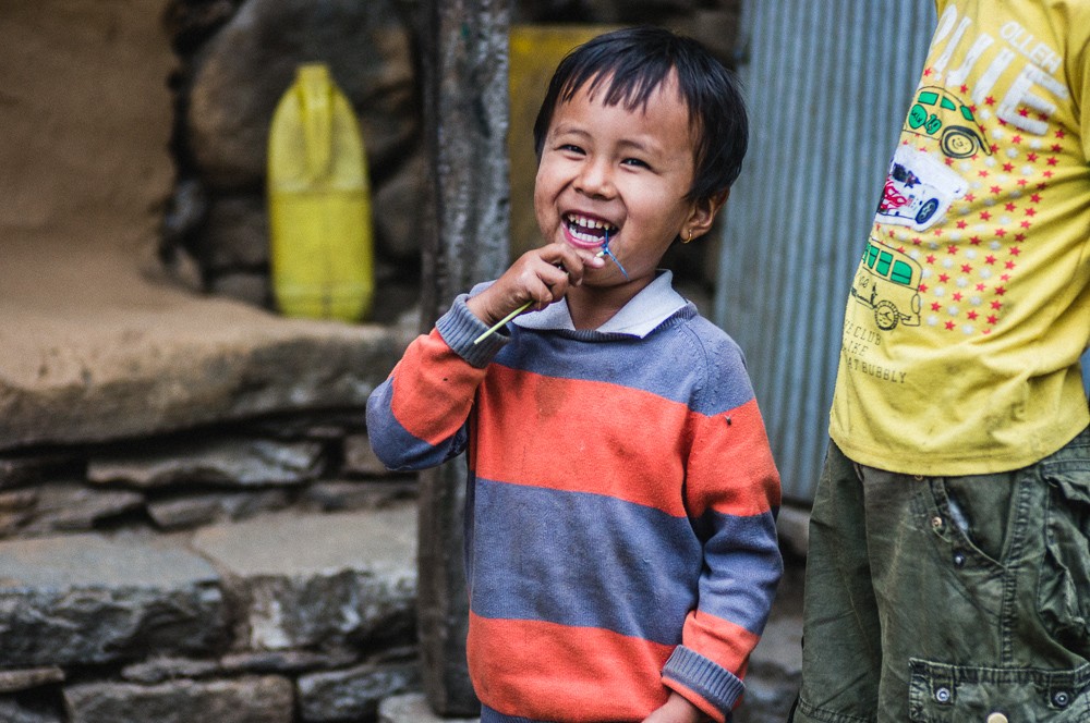 Child Laughing In Nepal Village Annapurna Circuit
