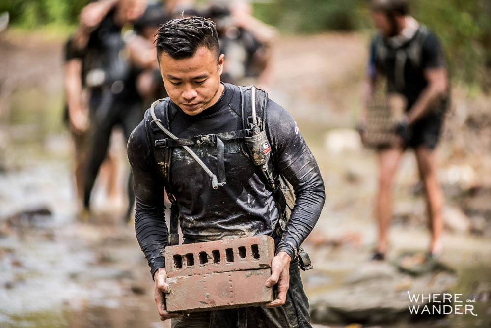 Muddy Brick Carry During Spartan Race 12 Hour Hurricane Heat In Chicago