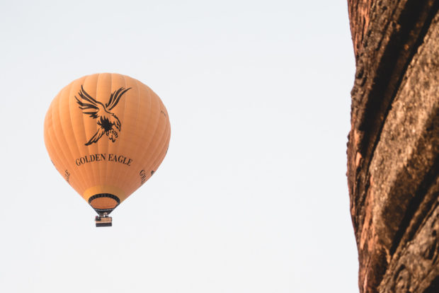 Golden Eagle Hot Air Balloon At Sunrise Over Bagan