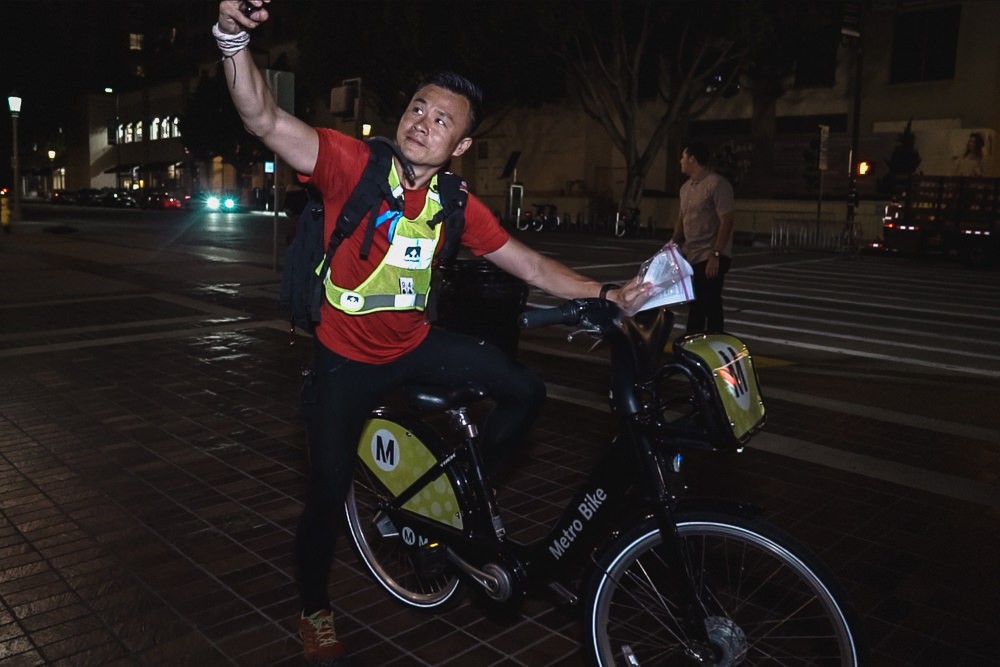 Racer taking selfie on Metro Bike In Old Town Pasadena