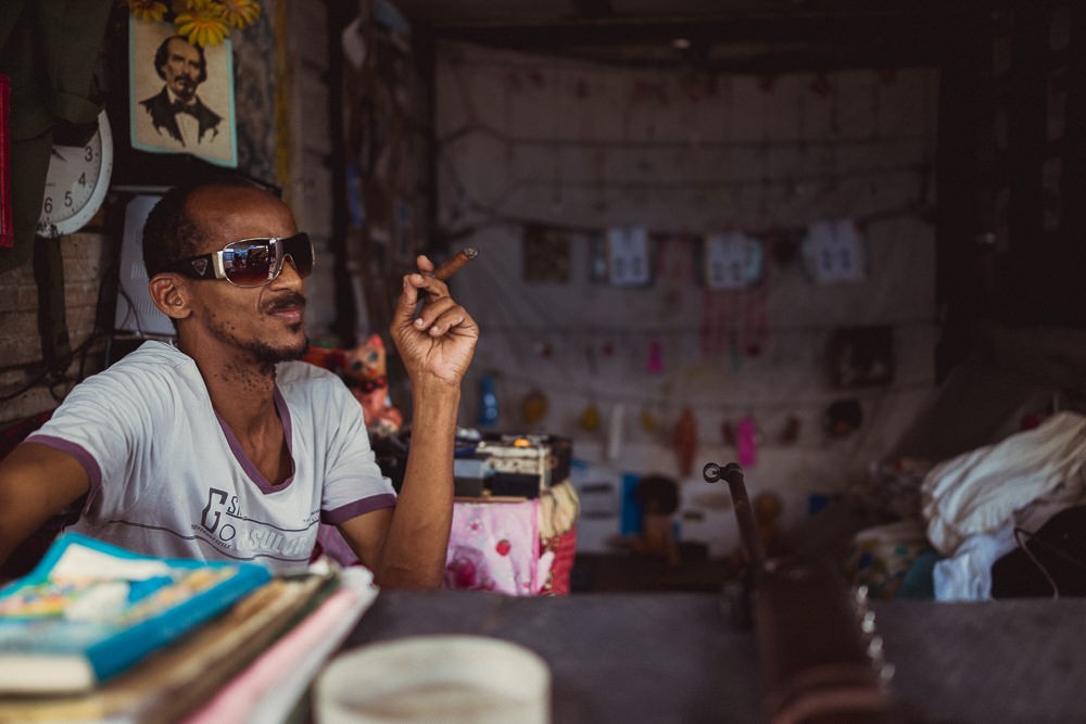 Portrait of gun gallery man in Havana