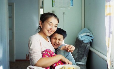 Kyrgyz Girl Sits With Her Disabled Sister