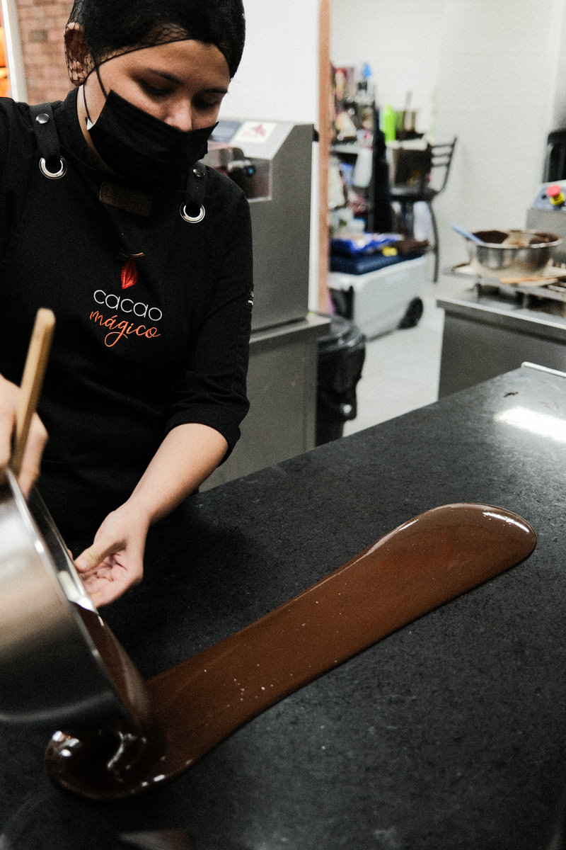 Chocolate being cooled to for tempering