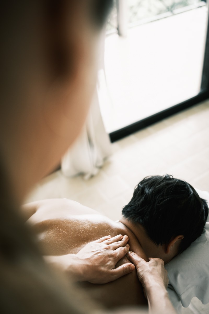 Masseuse view of hands massaging