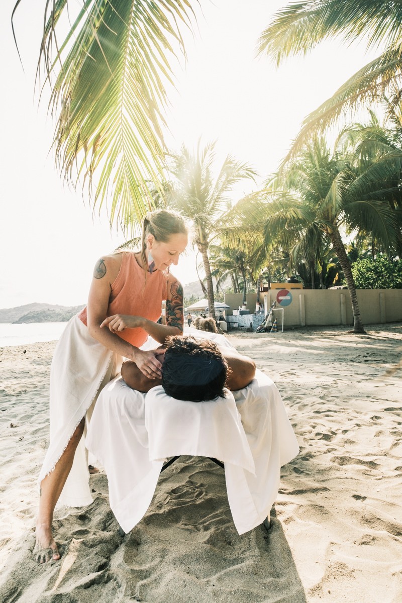 Man getting a beach massage in Sayulita