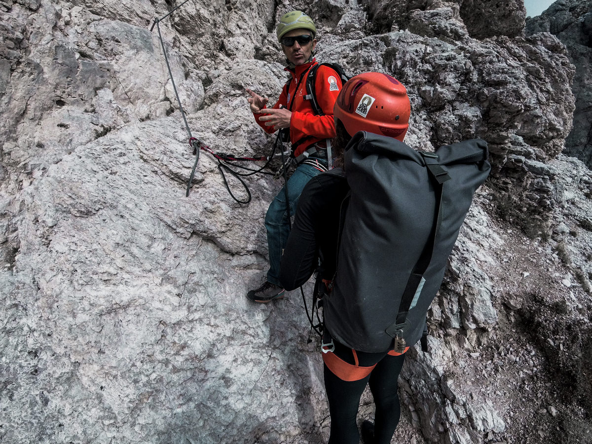 Climbers ascending Via Ferrata on Piccola Cir Dolomites