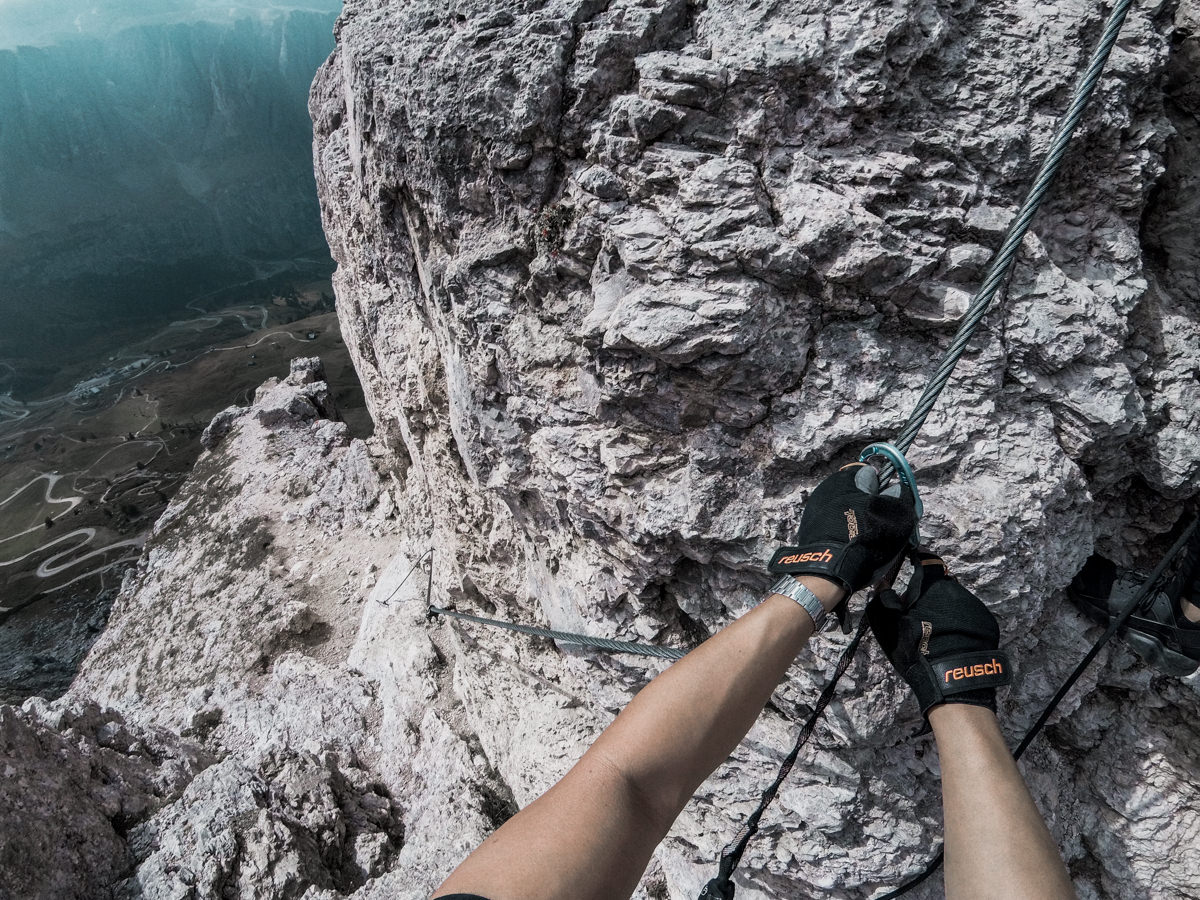 Hands on climbing line of Via Ferrata route on Piccola Cir shot on GoPro