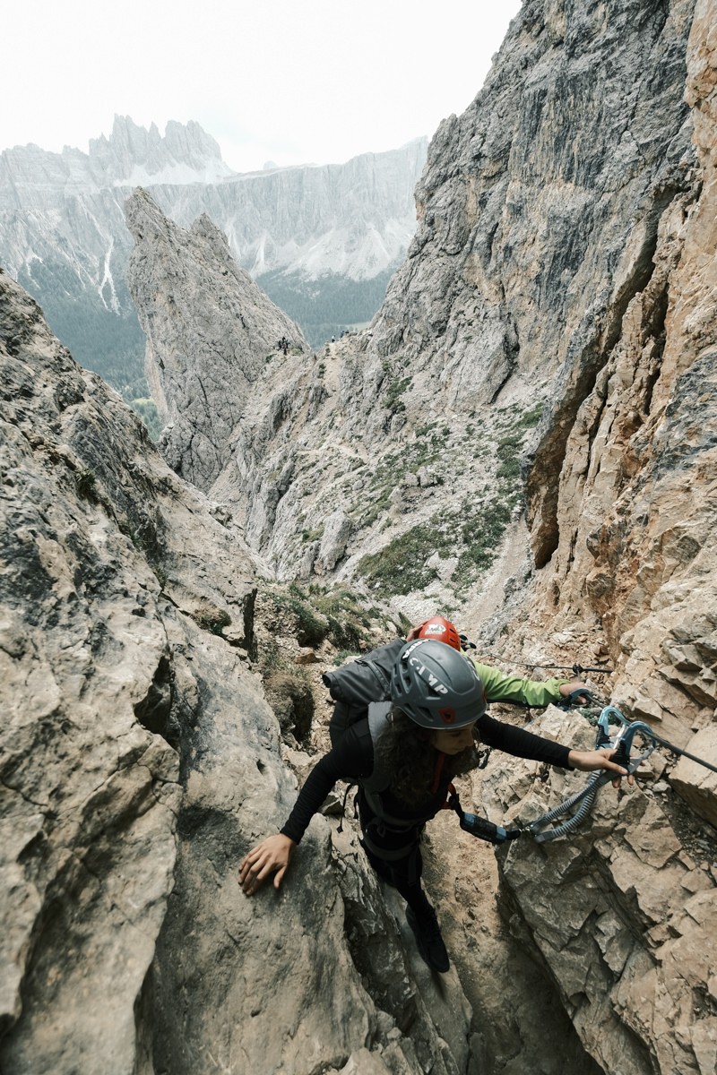 Climber traversing Via Ferrata to Rifugio Nuvolau and Ra Gusela shot on Fujifilm X-T4