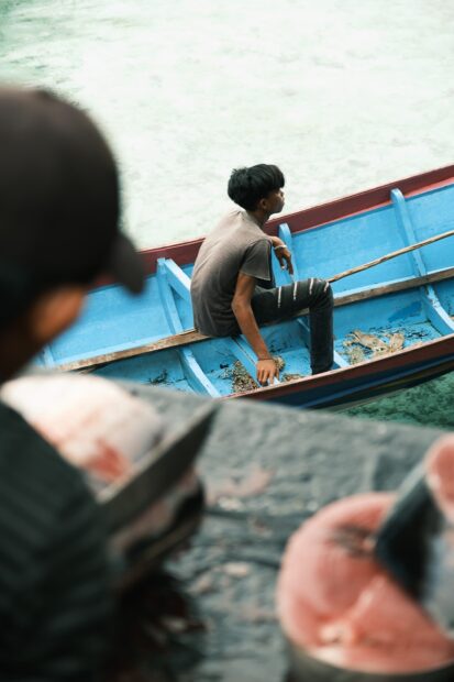 Sea gypsy with crab in boat