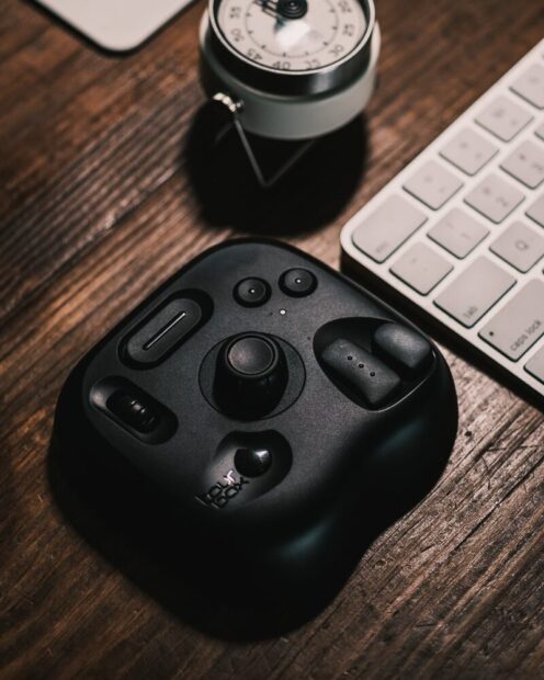 Tourbox Lite next to keyboard and timer