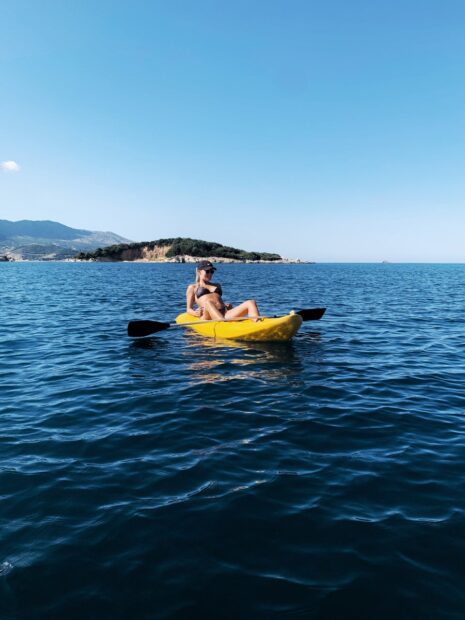 Girl kayaking at Ksamil