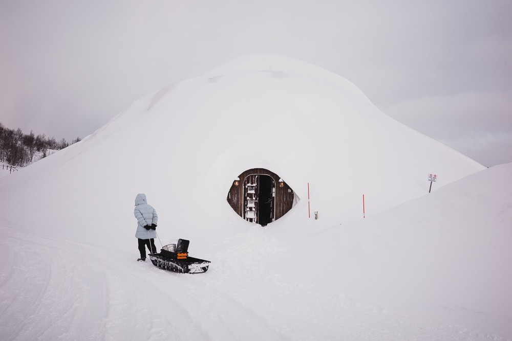 Sled-pull outside snowhotel mound in Kirkenes Norway