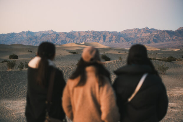 Mesquite Dunes in Death Valley with 3 girls in the foreground