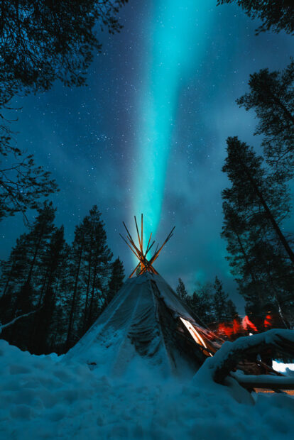 Northern lights over teepee in Finland Lapland Saariselka