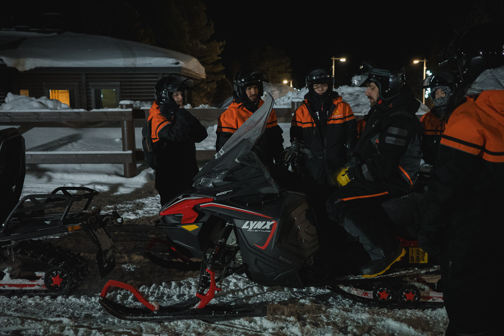 Sowmobile tour at night in Lapland Saariselka