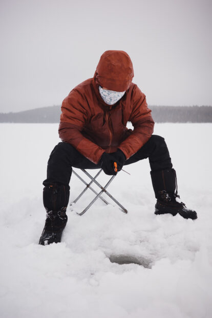 Ice fishing at Norvajarvi Lake in Rovanemi