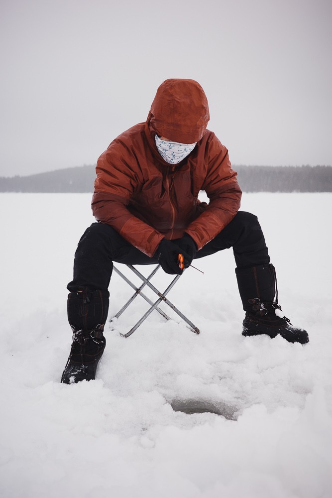 Ice fishing at Norvajarvi Lake in Rovanemi