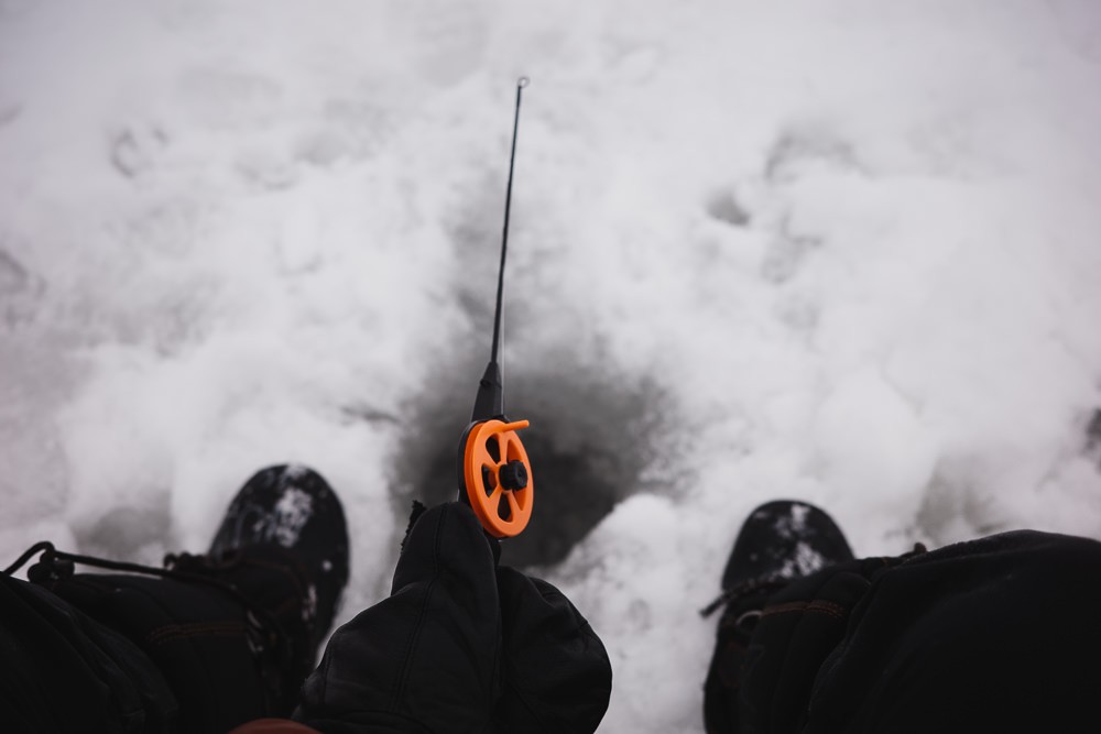 Ice fishing at Norvajarvi Lake in Rovanemi