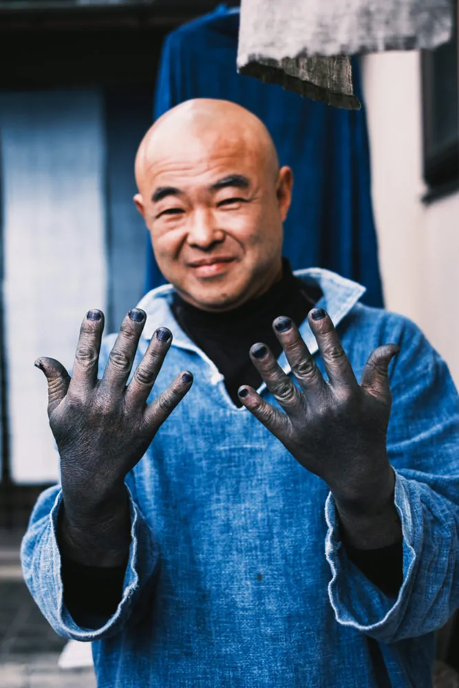 Hands of an indigo dyer
