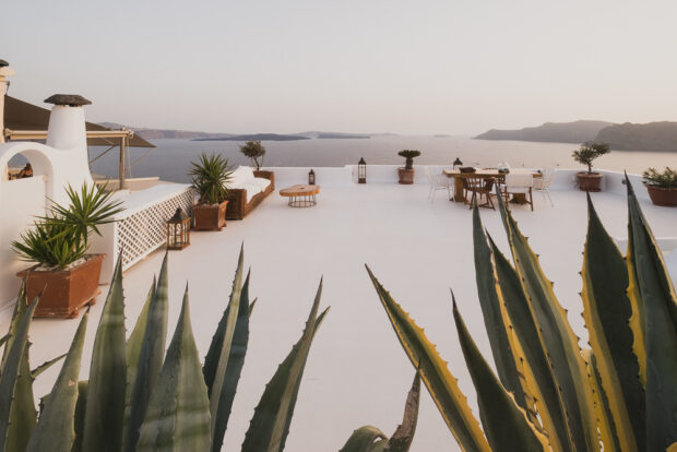 Restaurant terrace overlooking caldera in Oia
