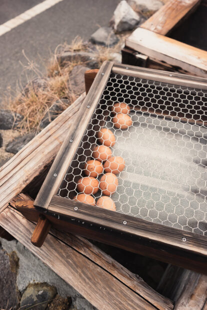 Eggs steaming over geothermal vents at Okamotoya in Beppu