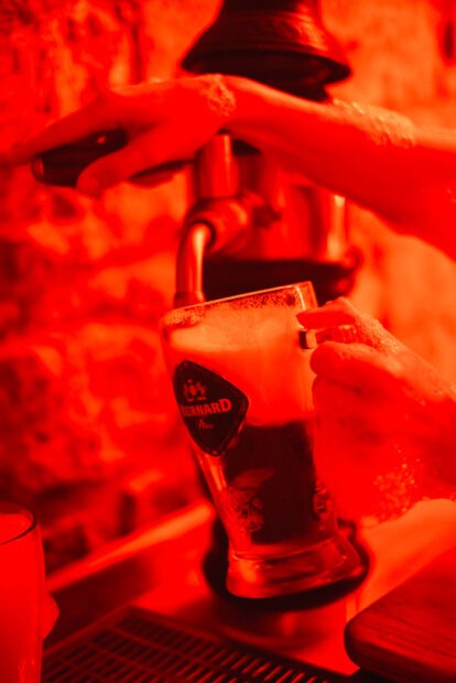 Pouring fresh beer from tub tap at beer spa in Prague