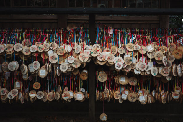 A post with hundreds of nyuto regatta onsen hopping pass medallions