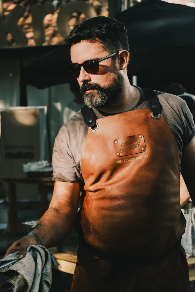 Chef Ricardo Ferreira grilling at Chefs on Fire Portugal