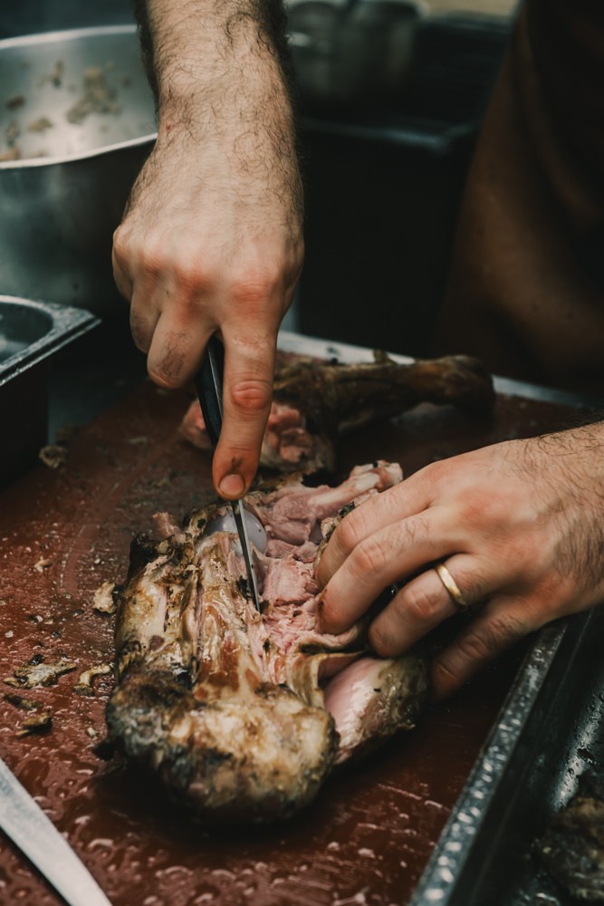 Hand cutting meat at Chefs on Fire Portugal