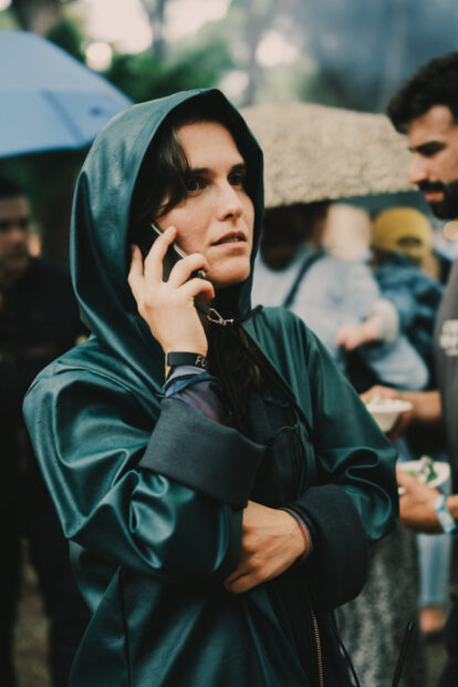 Sofia Santos taking a call behind the scenes at Chefs on Fire Cascais