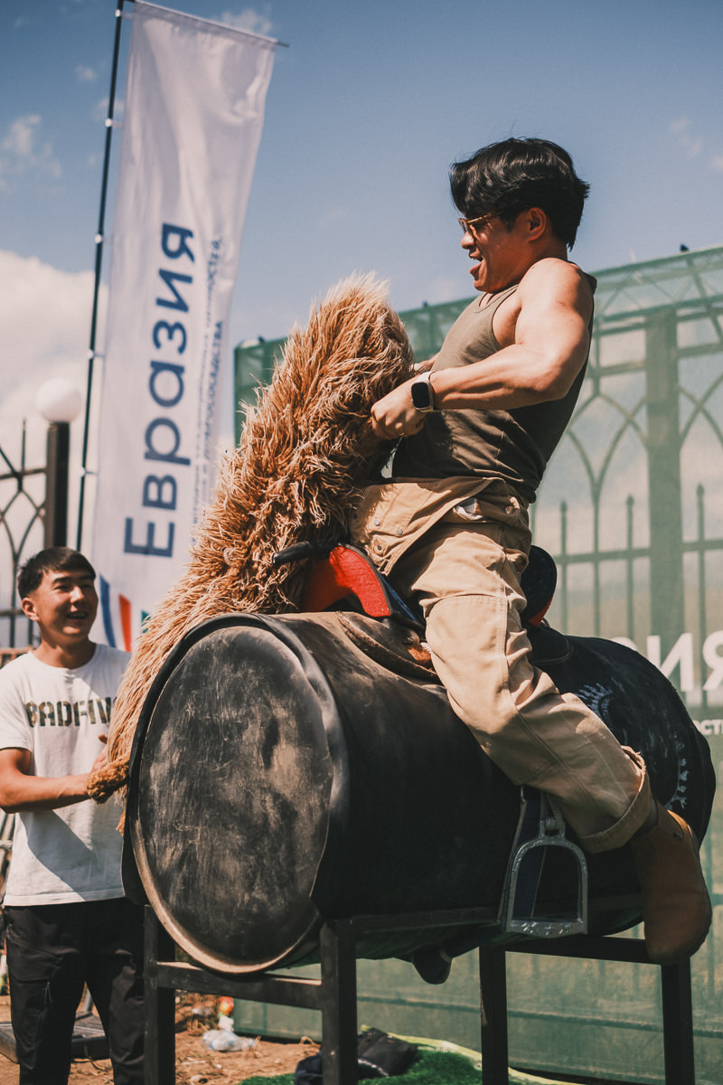 Trying out a fake Kok-Boru Ulak goat carcass at the world nomad games